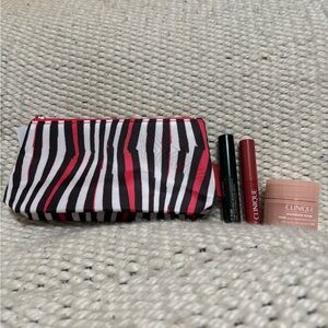 Brand new Clinique Minis Makeup Set with Makeup Bag. Would be a cute gift!